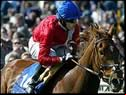 Kieren Fallon and Russian Rhythm took the 2003 1,000 Guineas 